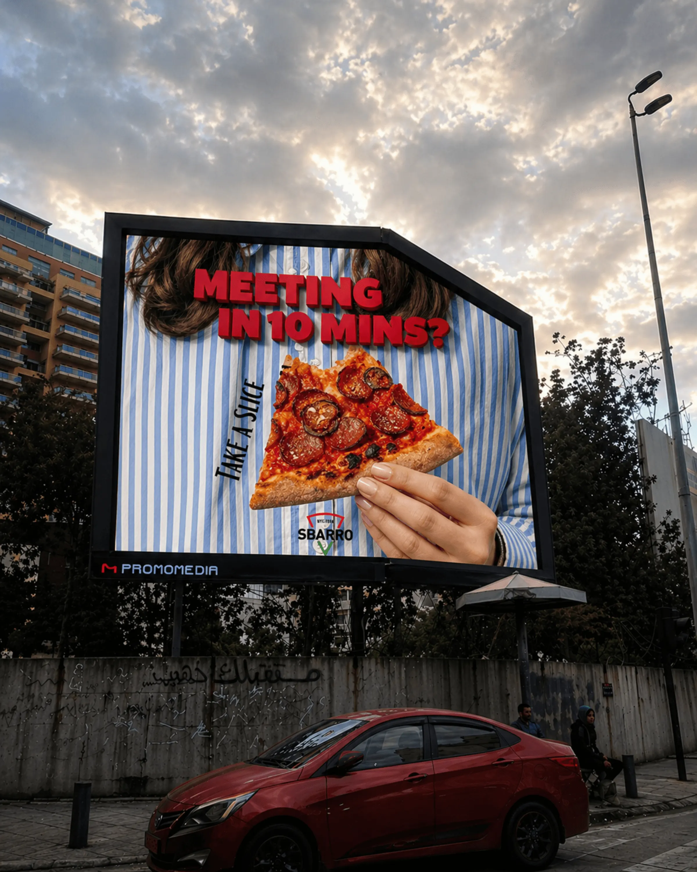 Sbarro 3D billboard: a hand holding out a pepperoni slice under the line “Meeting in 10 mins?”